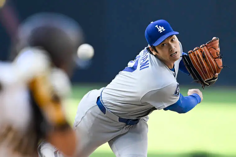 Dodgers’ Shohei Ohtani beats Padres with his bat, arm