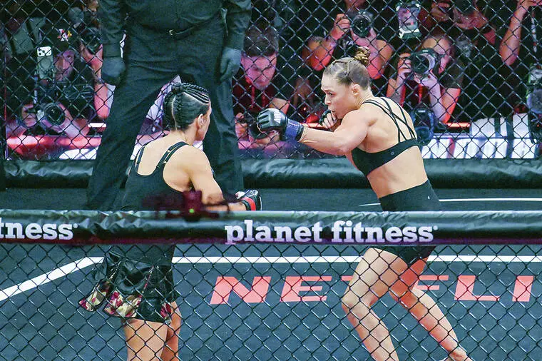 Ronda Rousey re-retires after 17-second submission defeat of Gina Carano