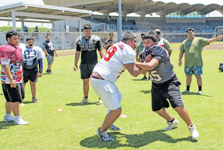 ‘We are so very talented on every island’: ‘Bows football coaches visit Hilo