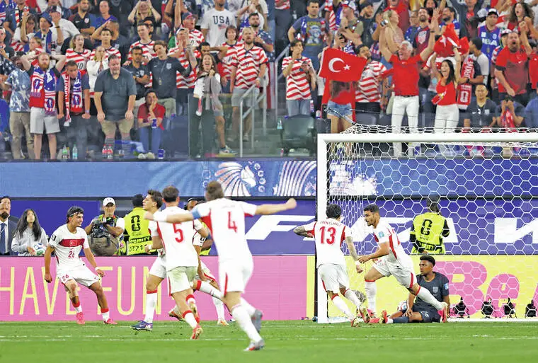 Turkey beats altered US lineup with last-minute goal in group finale