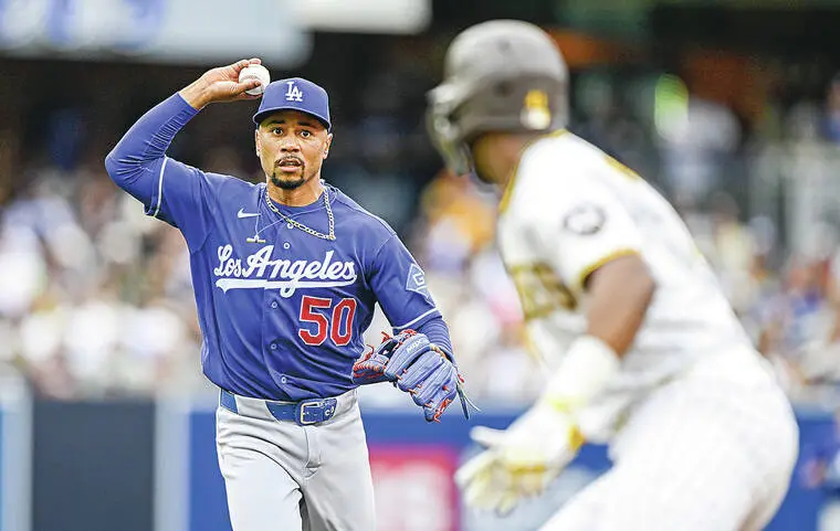 Dodgers score 9 runs in 6th inning to power past Padres