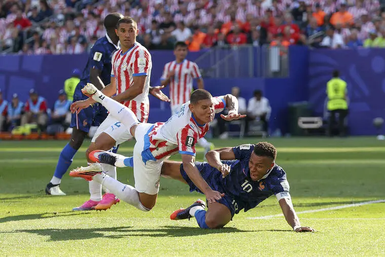 Kylian Mbappe’s penalty lifts France past Paraguay into quarterfinals