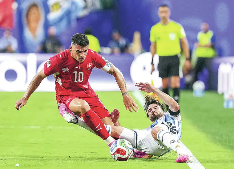 Argentina oust Switzerland in extra time, advance to semifinals