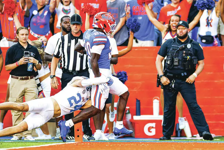 NCAA roundup: Jadan Baugh scores 3 TDs as No. 21 Florida knocks off No. 4 Ole Miss
